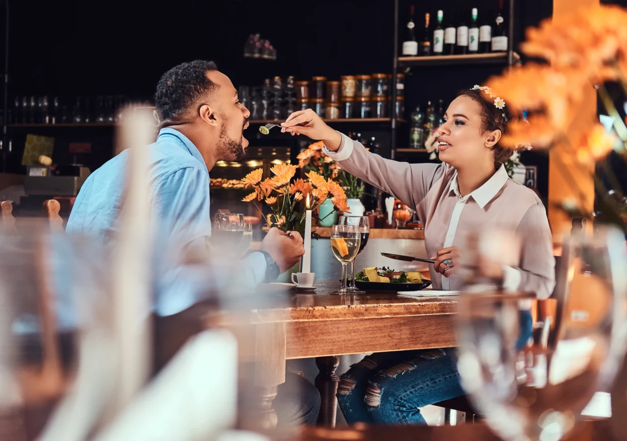 beautiful-african-american-couple-love-having-great-time-together-their-dating-attractive-couple-enjoying-each-other-young-woman-feeding-her-man-restaurant